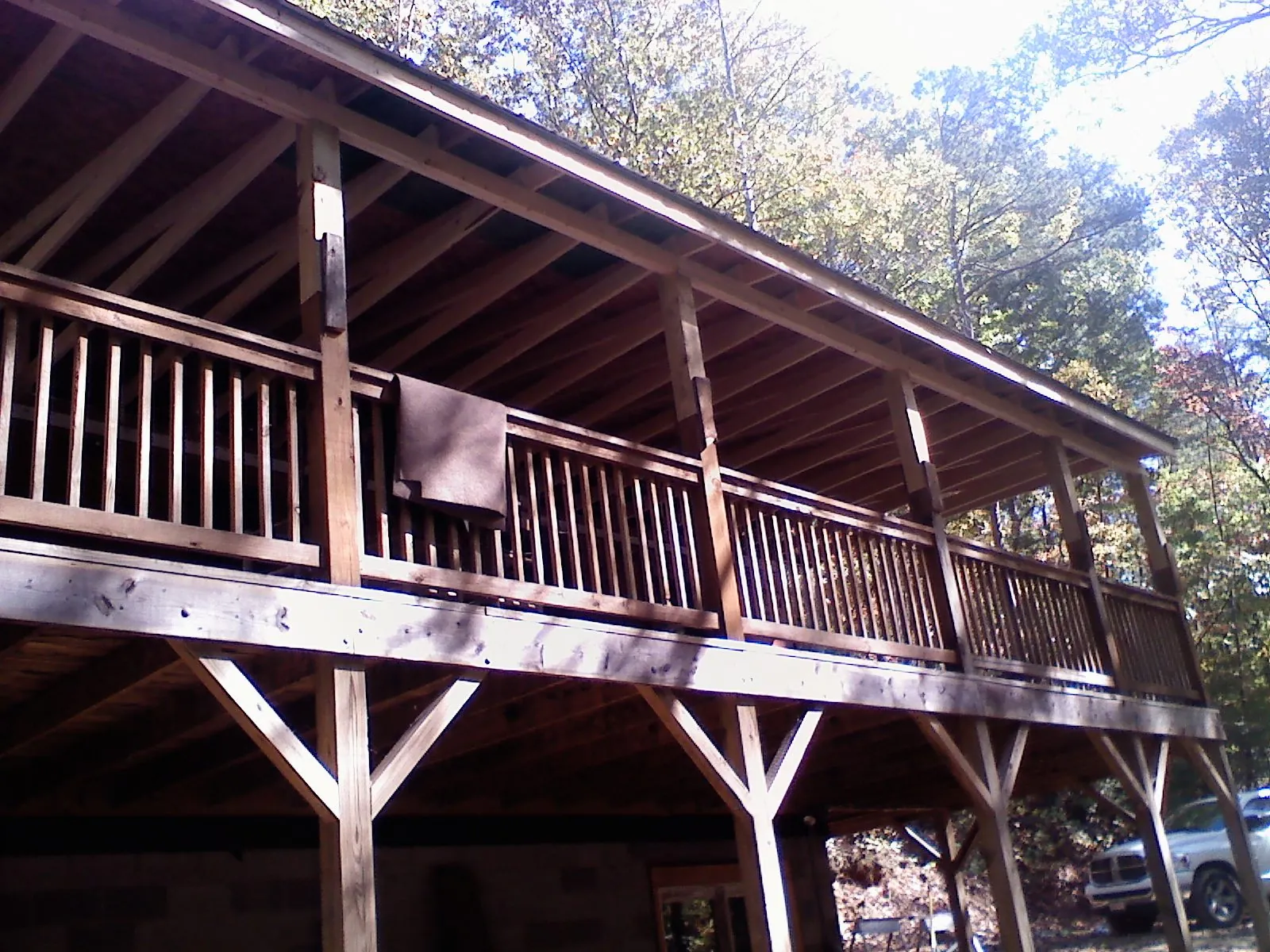 Timber framing under a new elevated porch and deck — Roof Leak Repair in Commercial Point by Roofing Brothers